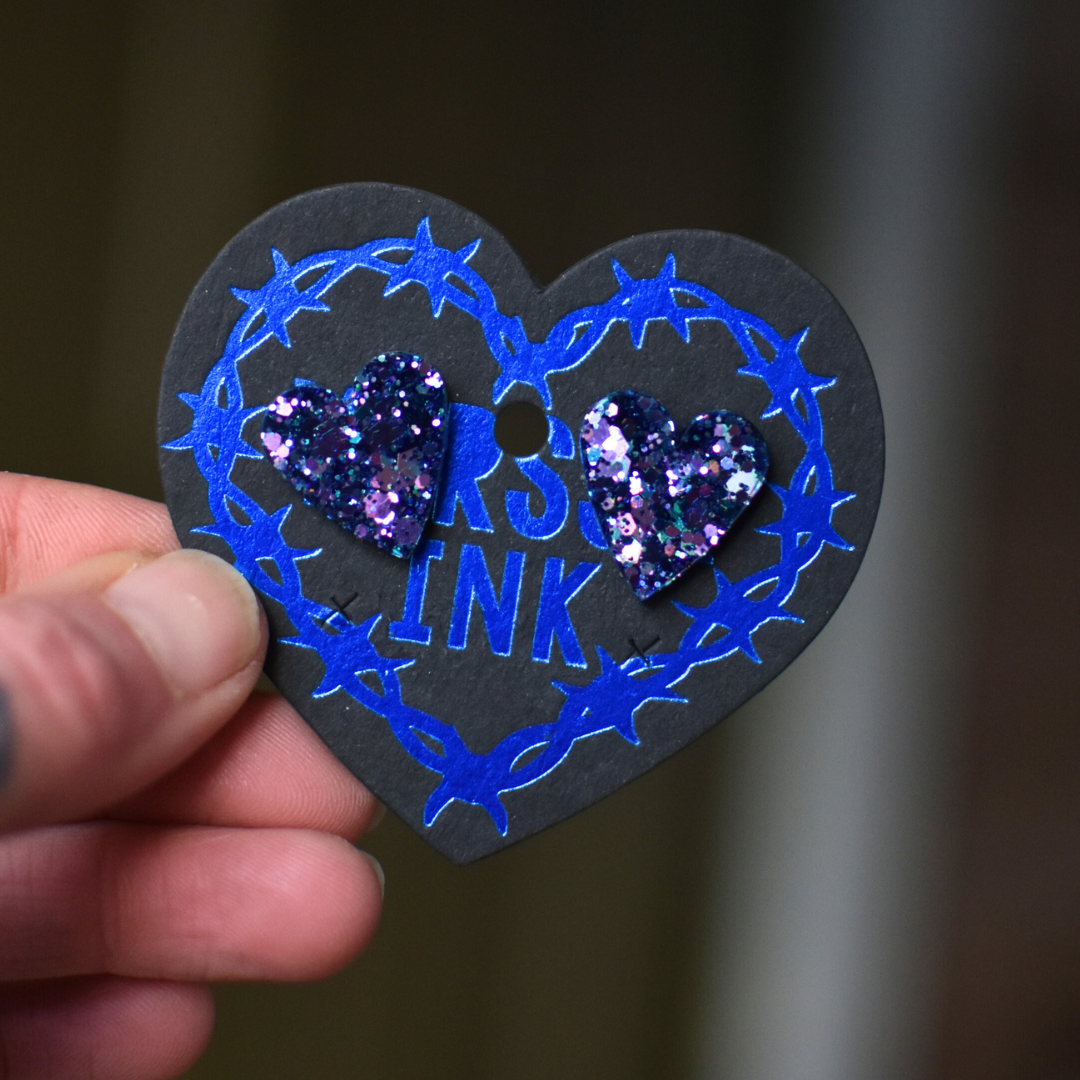 Överi Bling Nappi korvikset