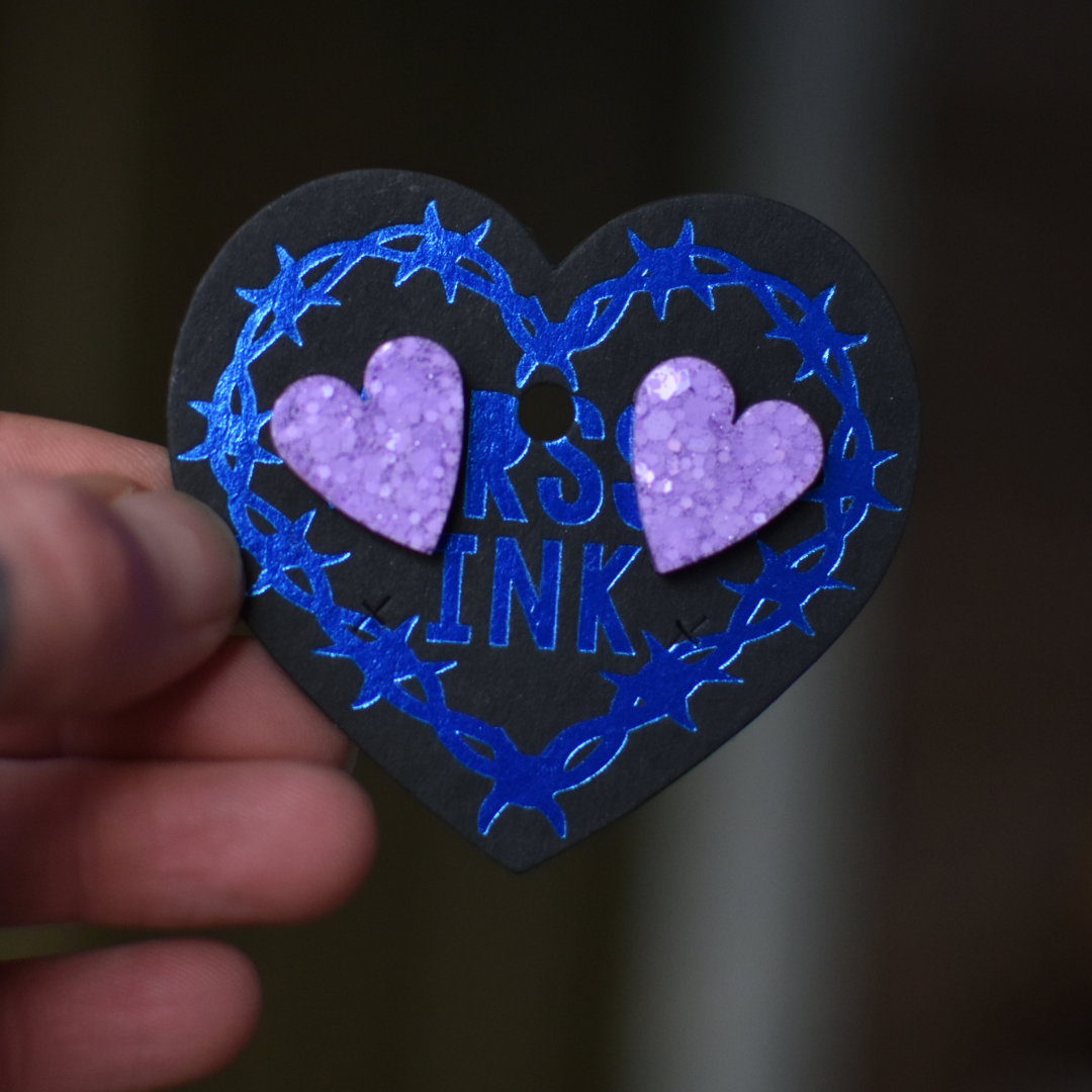 Överi Bling Nappi korvikset